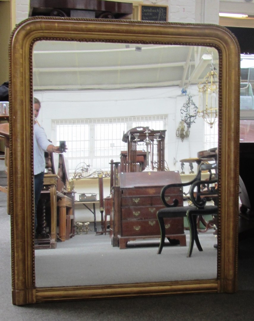 Appraisal: A Victorian gilt framed overmantel mirror with moulded decoration cm