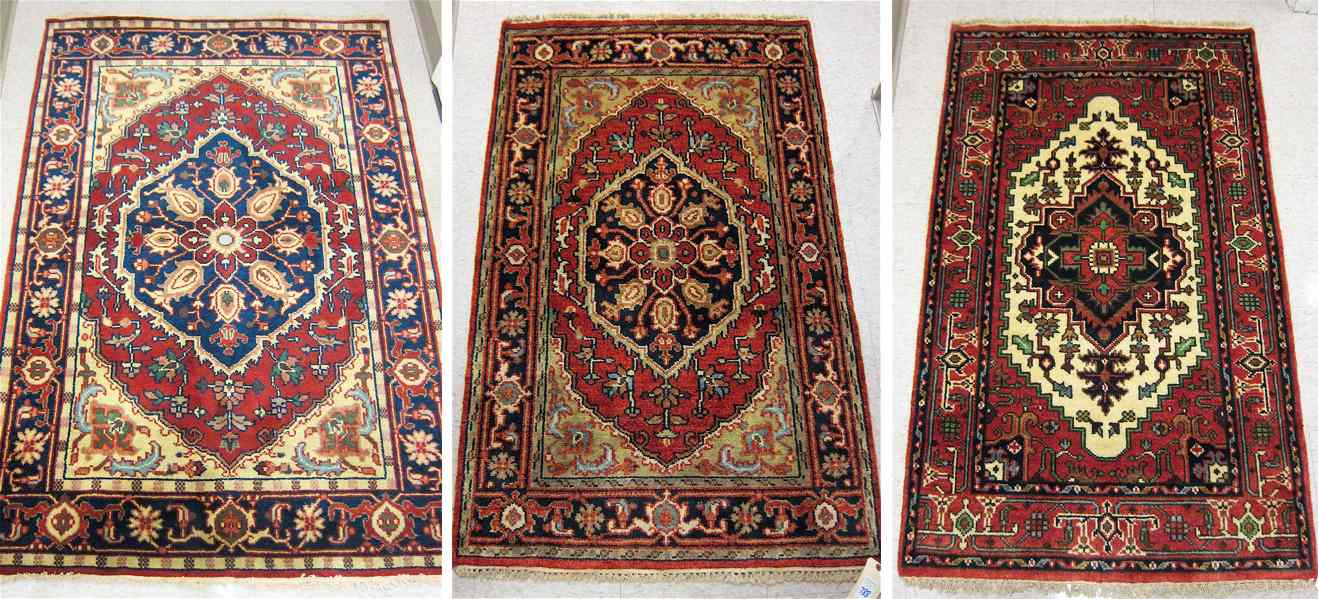 Appraisal: THREE SIMILAR HAND KNOTTED ORIENTAL AREA RUGS all Persian Serapi