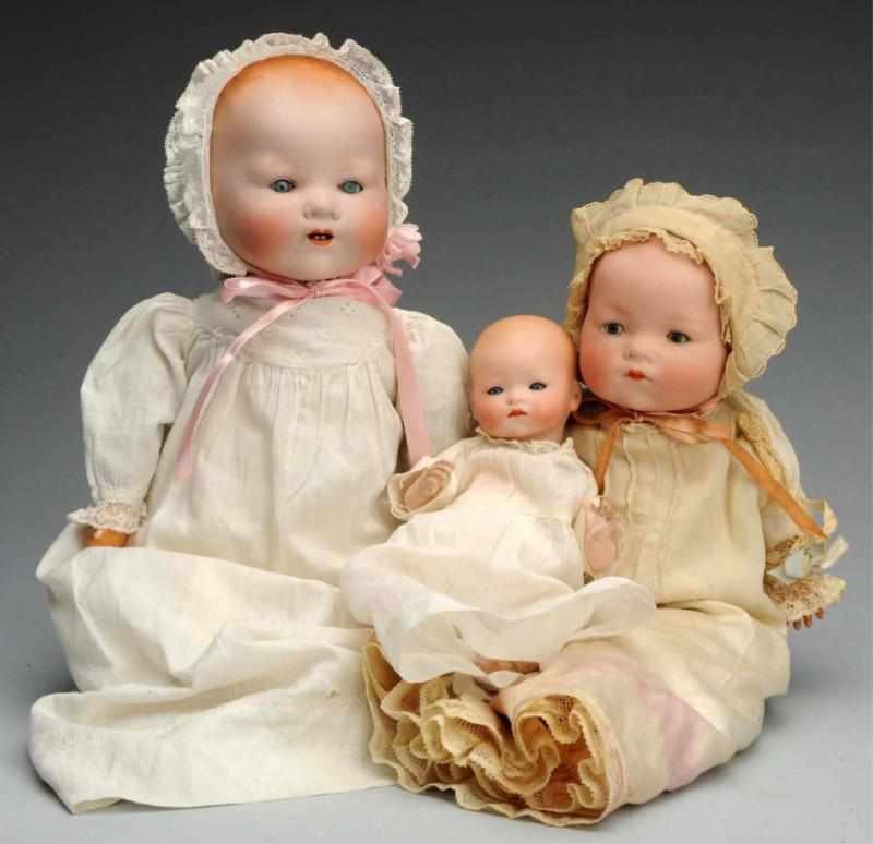 Appraisal: Lot of German Baby Dolls All Armand Marseille bisque heads