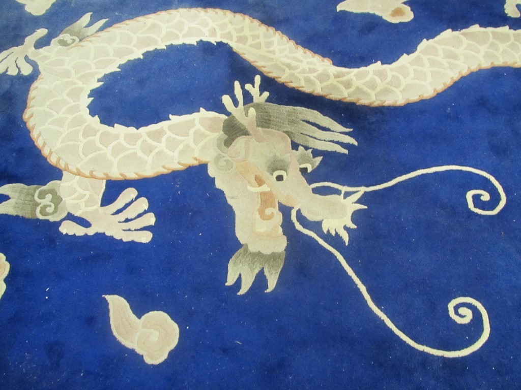 Appraisal: Chinese carpet with dragon decoration