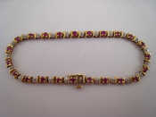 Appraisal: A carat gold ruby and diamond bracelet approx cm -