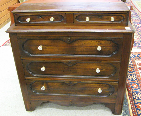 Appraisal: VICTORIAN WALNUT CHEST OF DRAWERS American last quarter of the