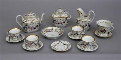 Appraisal: PARIS PORCELAIN PART TEA SERVICE Comprising a teapot creamer covered