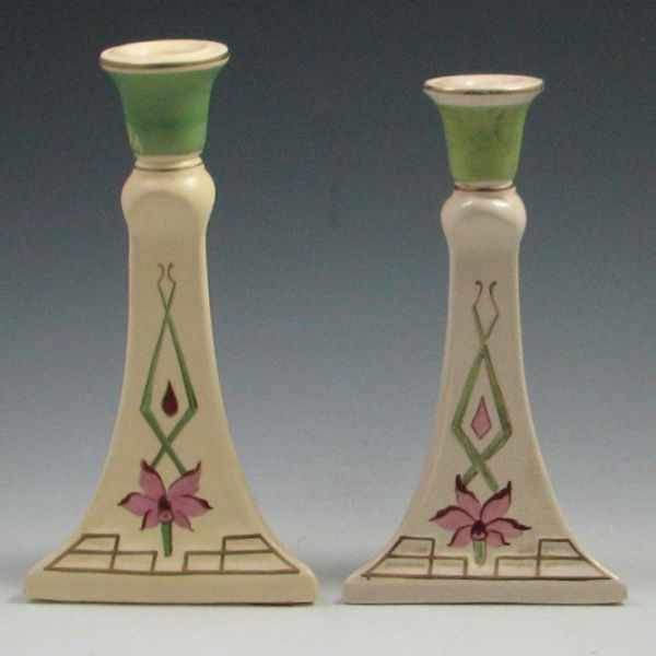 Appraisal: Roseville Creamware Candle Sticks both unmarked left has tiny bruise