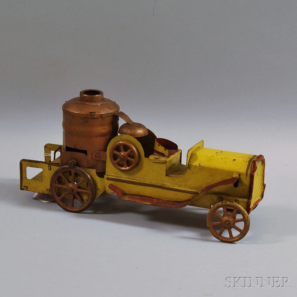 Appraisal: Vintage Sheet Metal Friction-driven Pumper Wagon Toy the yellow- and