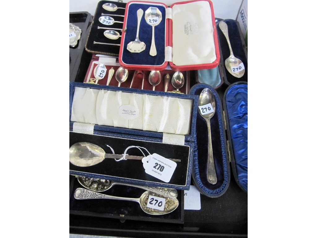 Appraisal: A tray lot of assorted cased silver spoons