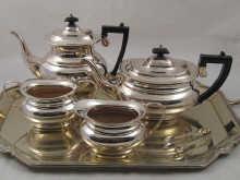 Appraisal: A four piece Elkington silver plate tea set with tongs