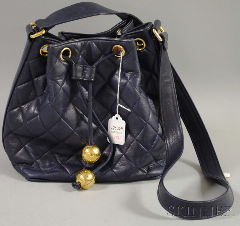 Appraisal: Vintage Chanel Navy Blue Quilted Leather Purse with gold-tone ball