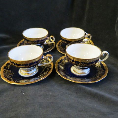 Appraisal: Cobalt Gold Porcelain Cups Saucers excellent