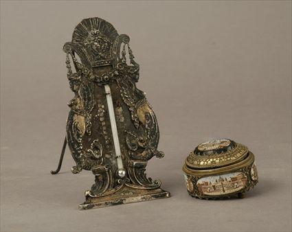 Appraisal: Continental Louis XIV-Style Silver Table Thermometer Together with an Italian