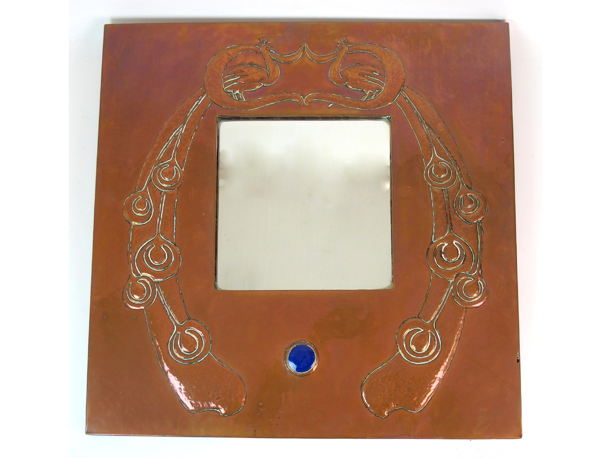 Appraisal: An Arts and Crafts style copper wall mirrorthe square shaped