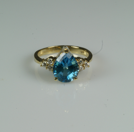 Appraisal: K WG teardrop blue topaz ring small diamonds size dwt