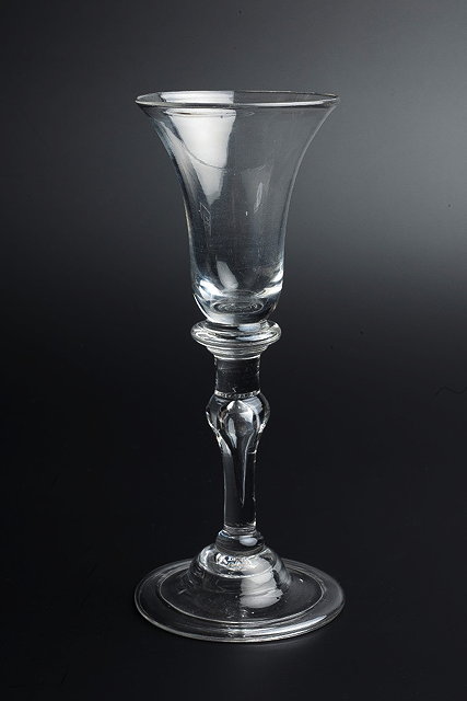 Appraisal: AN TH CENTURY WINE GLASS the flared trumpet shaped bowl