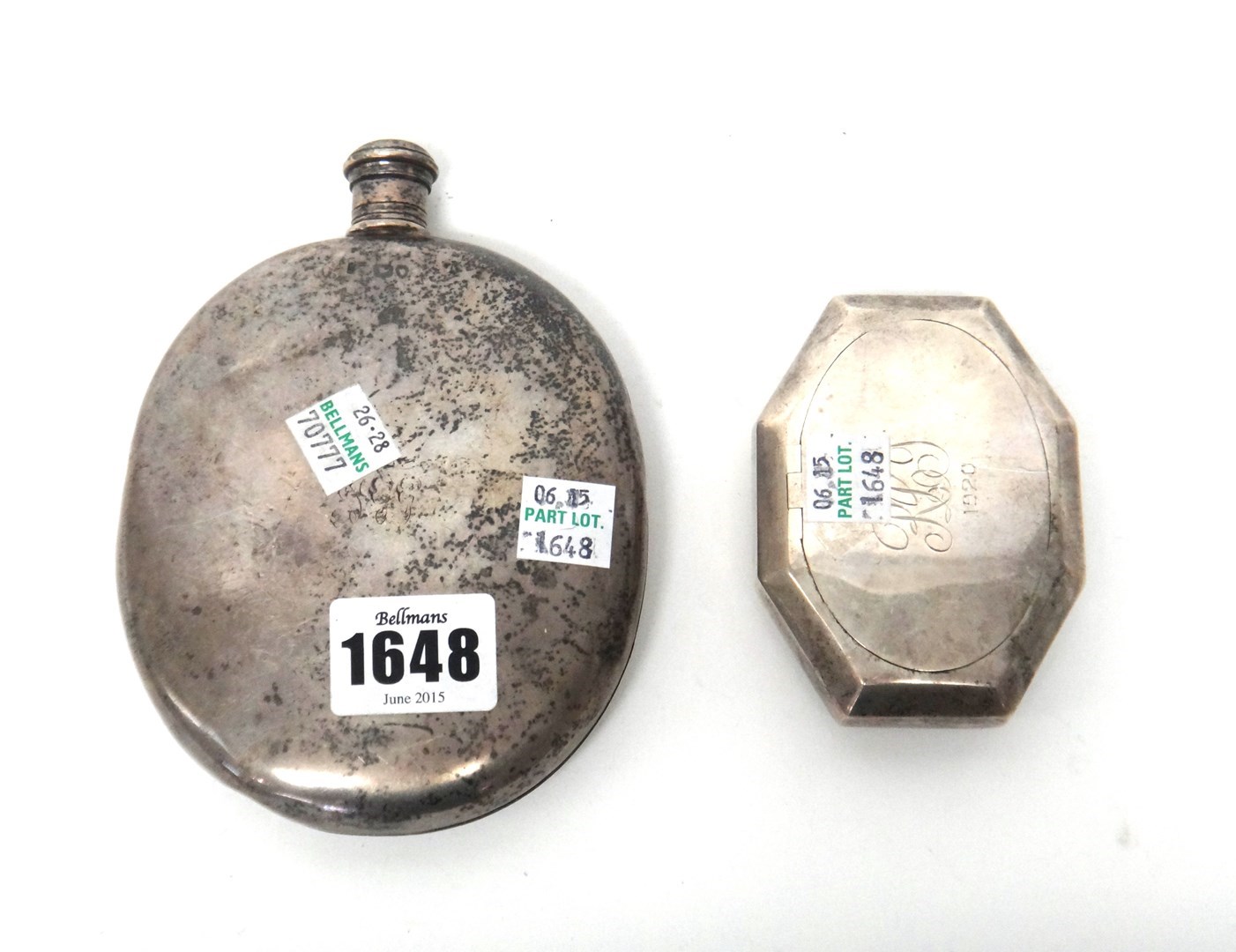 Appraisal: A silver spirit flask of oval form having a screw