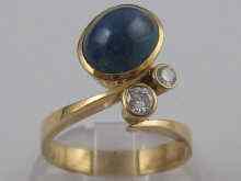 Appraisal: A yellow metal tests carat gold cabochon sapphire and diamond