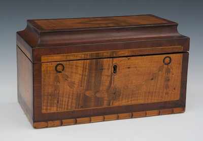 Appraisal: A Neoclassical Oblong Tea Caddy The three-compartment tea caddy has