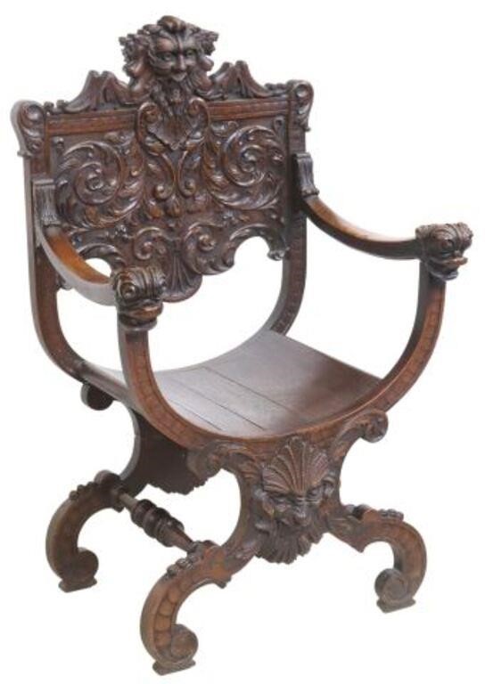 Appraisal: Renaissance Revival oak curule armchair th c having carved grotesque