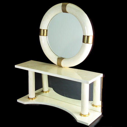 Appraisal: STYLE OF KARL SPRINGER Ivory laminate console with mirrored back