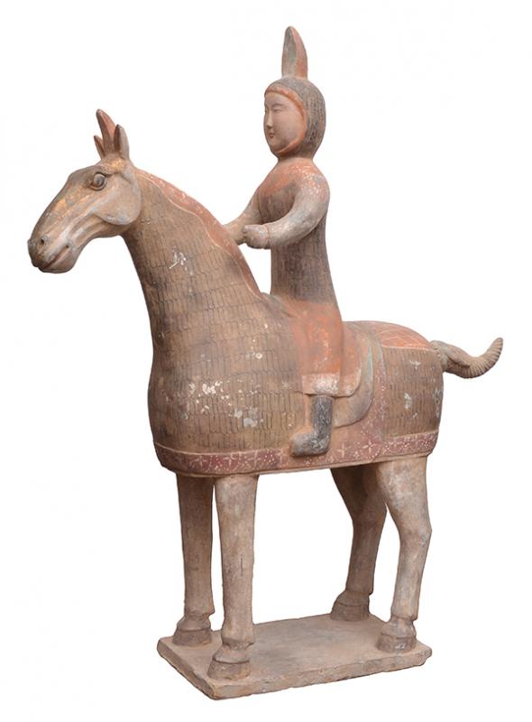 Appraisal: A CHINESE POTTERY FIGURE OF A HORSE AND RIDER TANG