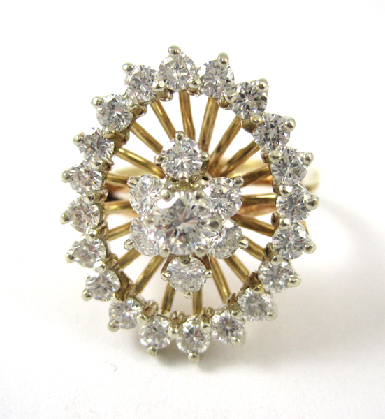 Appraisal: DIAMOND AND FOURTEEN KARAT GOLD RING set with round-cut diamonds