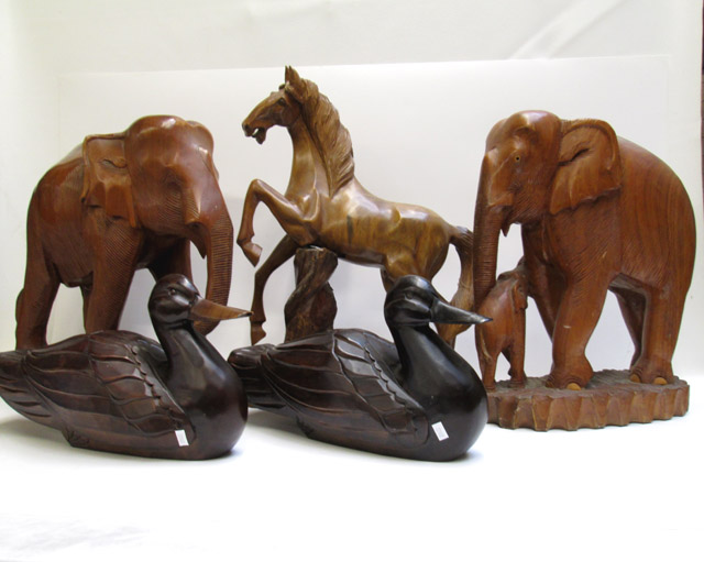 Appraisal: FIVE WOOD CARVED FIGURAL ANIMALS consisting of two elephants two