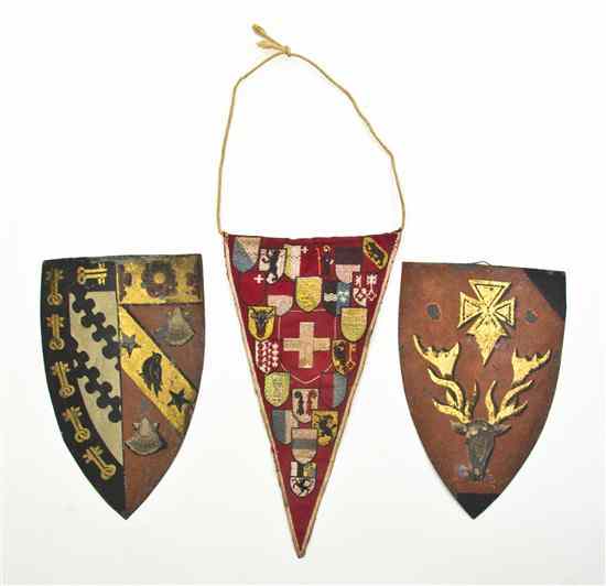 Appraisal: Two Tole Painted Crests each of shield form together with