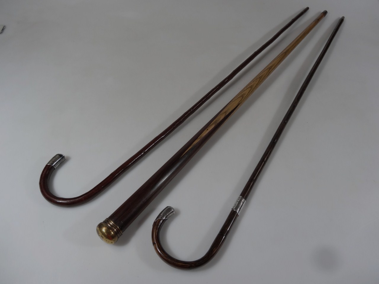 Appraisal: An early thC walking cane with silver tip and brass