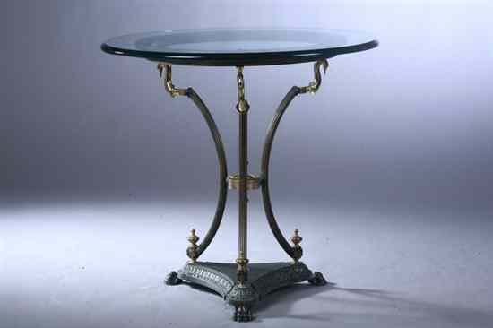 Appraisal: EMPIRE STYLE CAST-METAL AND BRASS MOUNTED SIDE TABLE Round glass