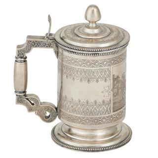 Appraisal: RUSSIAN SILVER TANKARD Engraved design featuring a reserve of a