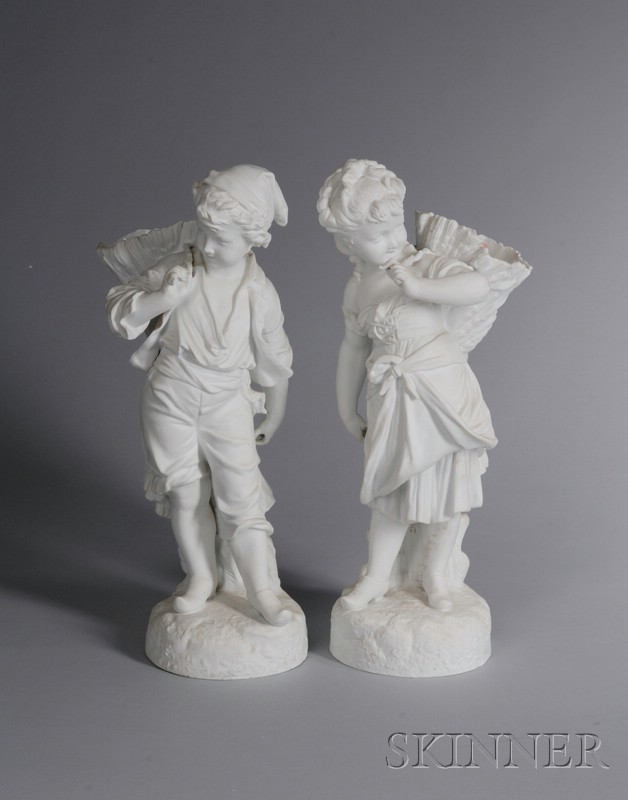 Appraisal: Pair of German White Bisque Figures of a Boy and