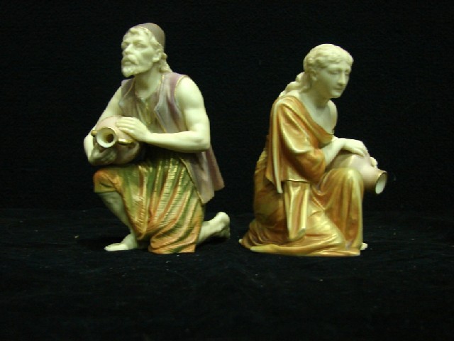 Appraisal: A pair of Worcester ivory kneeling figures of water carriers