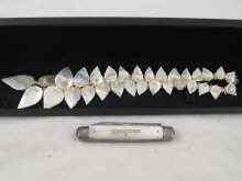 Appraisal: A silver and mother of pearl combination fruit knife and