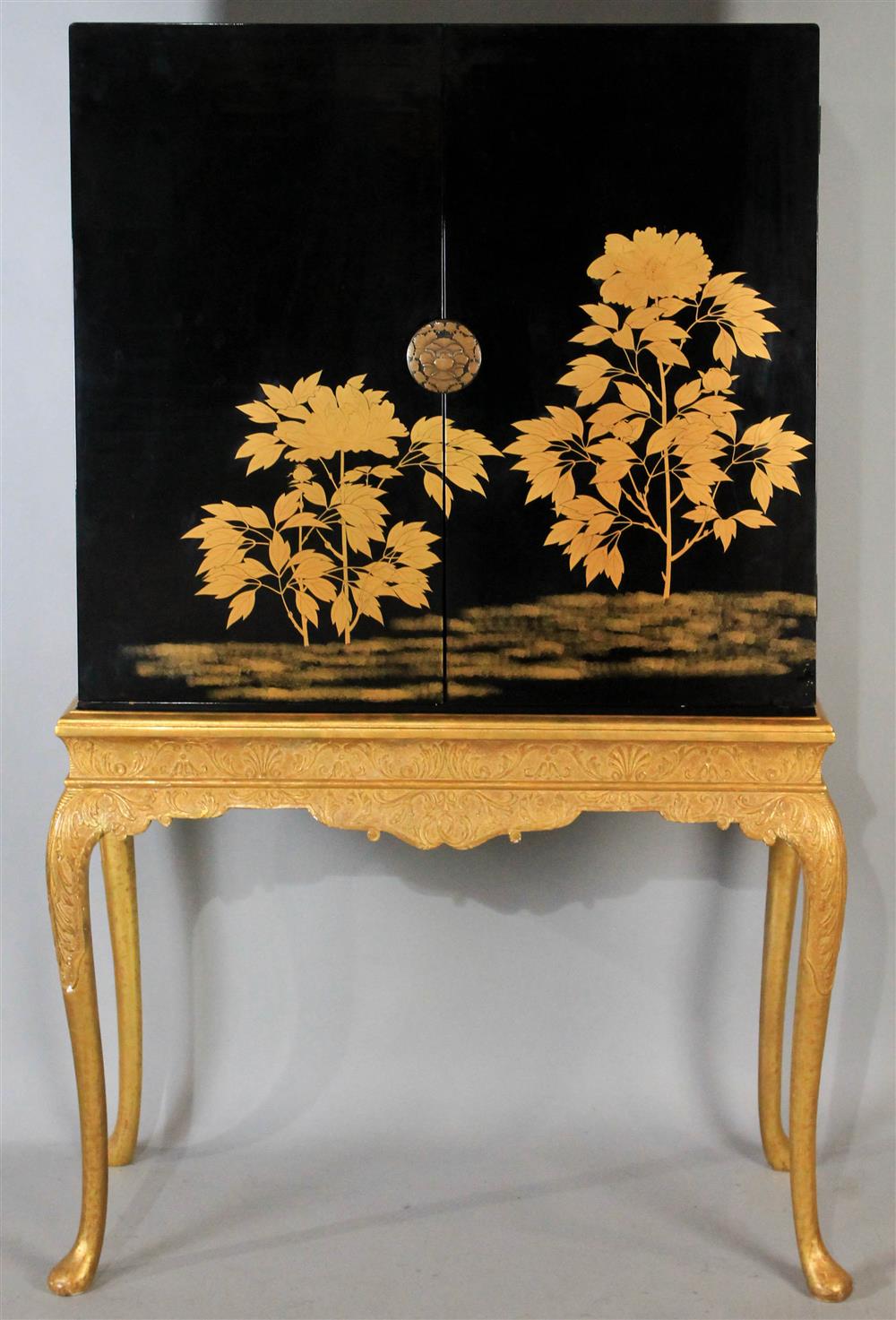 Appraisal: CHINIOSERIE STYLE BLACK LACQUER CABINET ON GILT QUEEN ANNE STYLE