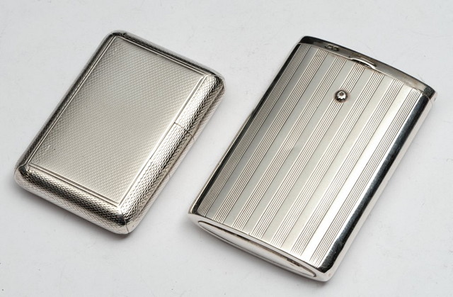 Appraisal: A SILVER SNUFF BOX with engine turned decoration and gilt