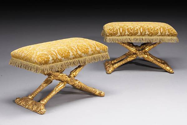 Appraisal: A pair of Neoclassical style giltwood stools Each with a