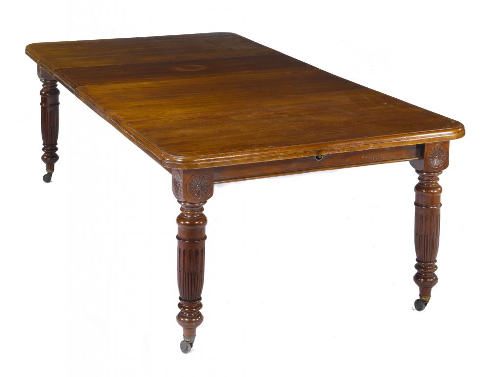 Appraisal: A VICTORIAN MAHOGANY EXTENDING DINING TABLE the moulded top on