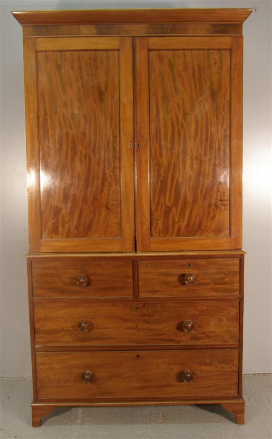 Appraisal: A GEORGIAN MAHOGANY LINEN PRESS on bracket feet with two