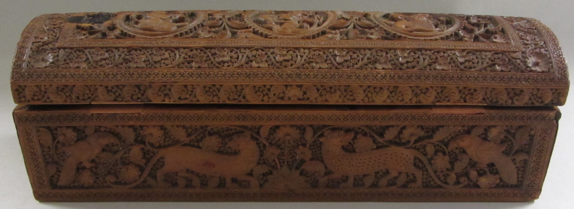 Appraisal: A sandalwood box Southern India or Sri Lanka intricately carved