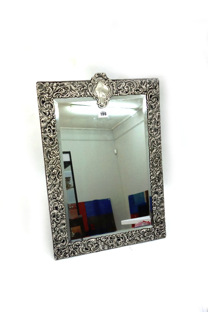 Appraisal: An Edwardian silver mounted easel back mirror Goldsmiths Silversmiths Company