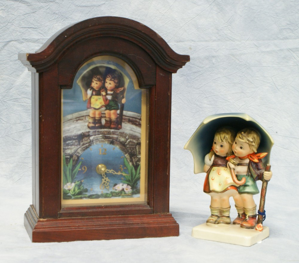 Appraisal: Hummel Stormy Weather clock figurine Hum TMK- figurine h clock