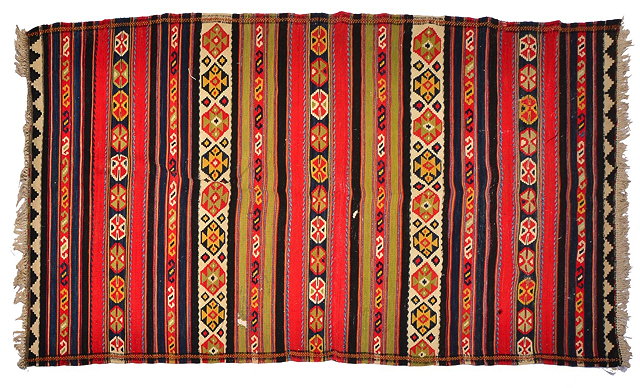 Appraisal: A PERSIAN SAVEH KELIM with red dark blue and green