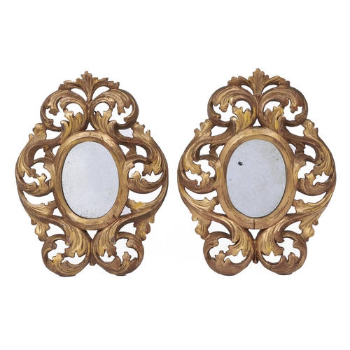 Appraisal: A pair of Venetian miniature giltwood mirrors th c the