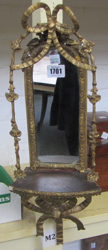 Appraisal: A pair of gilt gesso carved wooden wall mirrors th