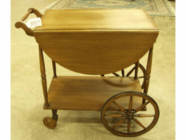 Appraisal: Vintage mahogany tea trolley with serving tray and drop leafs