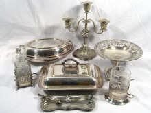 Appraisal: A quantity of silver plate including a three branch naturalistic