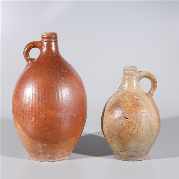 Appraisal: Two antique German bellarmine jugs th century or earlier some