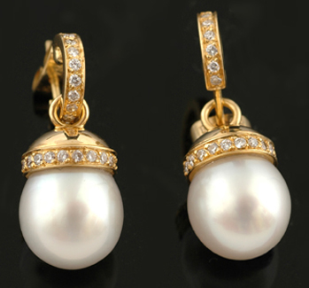 Appraisal: A pair of South Sea pearl and diamond earrings The