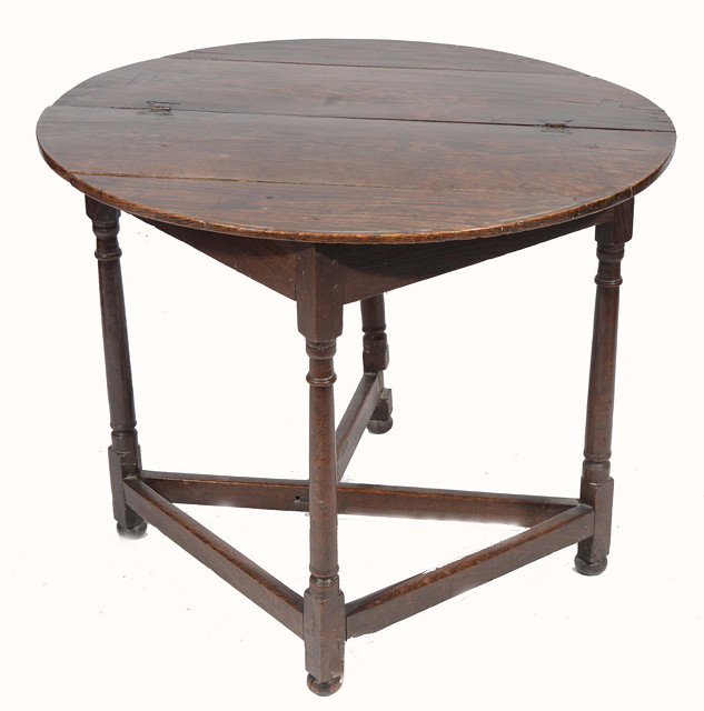 Appraisal: AN TH CENTURY CIRCULAR FOLD OVER TOP GATELEG TABLE the