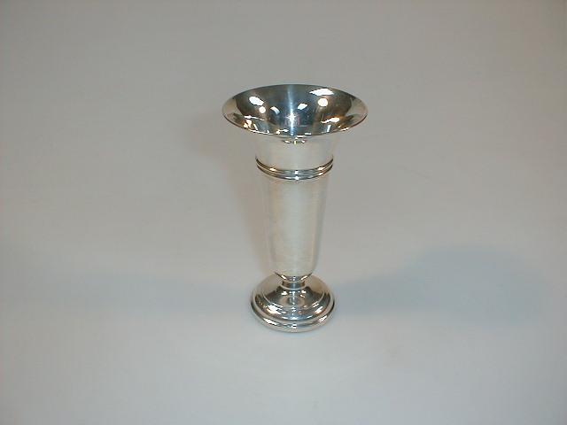 Appraisal: A silver spill vase with flared rim Birmingham assay