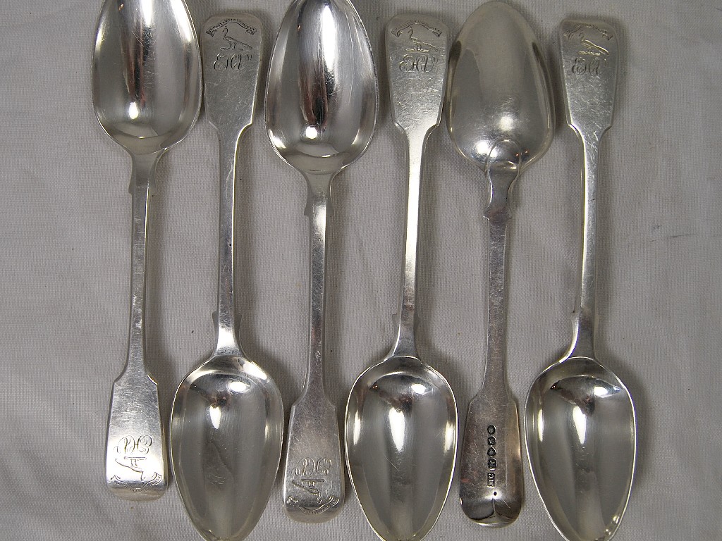 Appraisal: Half dozen silver fiddle pattern dessert spoons bearing peacock crest